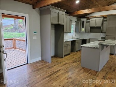 Main Level Kitchen Open Deck Forest Ave side
