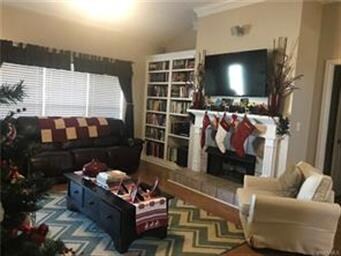Another view of the family room and gas fireplace.