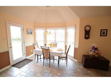 Delightful Bay Window embraces the Breakfast Room.