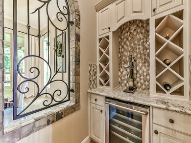 Window to the formal dining from the wine grotto.