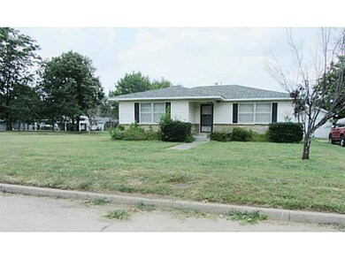 Exterior Front. Street view.  Home has brick trim.