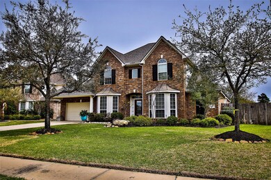 Welcome Home to 18902 Danbridge! Huge Corner Lot + 3 Car Tandem. Garage has a Professional Epoxy Floor and Work Shop Area W/Built-Ins.