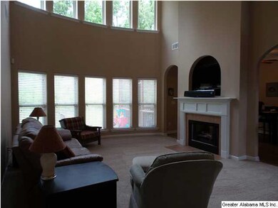 Beautiful two-story great room filled with natural