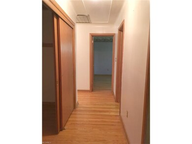 Continuation of Hardwood Flooring in hall. Additio