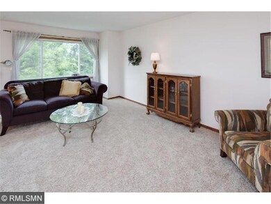 The living room is spacious and bright and feature