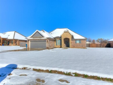 Single story home with a garage