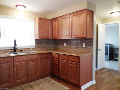 4870 Elmwood Dr, Sheffield Lake, OH 44054 - photo 7