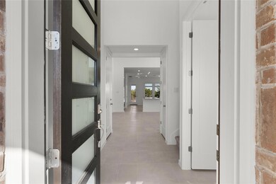 Hall featuring recessed lighting and baseboards