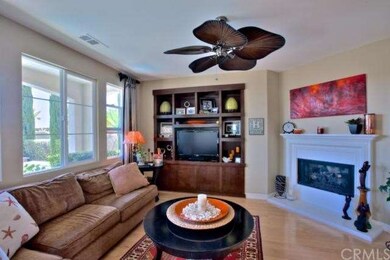 Family Room 2nd view - fireplace, windows to rear 