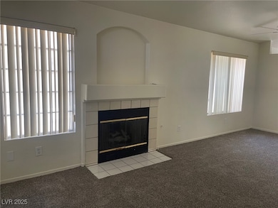 Unfurnished living room featuring carpet flooring,