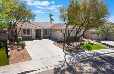 Single story home featuring stucco siding, an atta