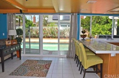 Family Room and Kitchen Open Open to Pool Area