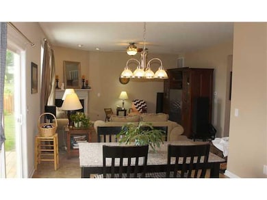 Family Room. Family room with gas insert fireplace and wired for surround sound.