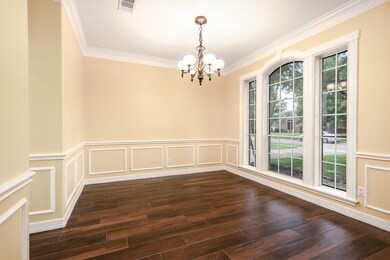 The dining room is directly to your right as you e