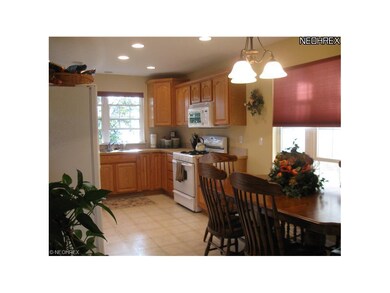 One view of large, eat-in, fully-equipped kitchen.