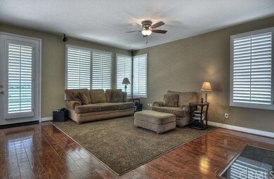 Family Room boasts custom distressed maple floorin