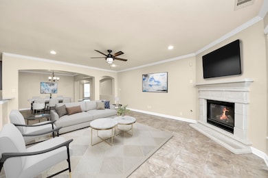 This spacious living area features an open floor p