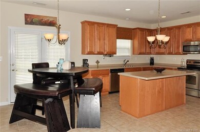 Breakfast area with French doors leading to rear y