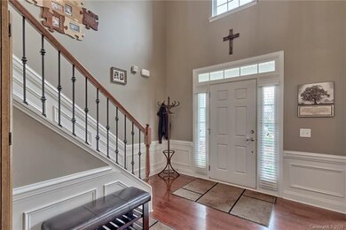 Lovely 2 story entry with extensive moldings.