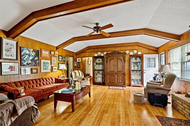 Living room featuring light hardwood / wood-style 