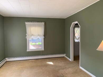 Living room off of dining room and foyer