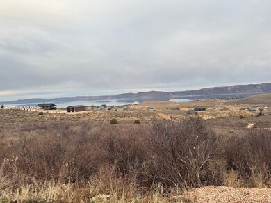 Mountain view featuring a large body of water