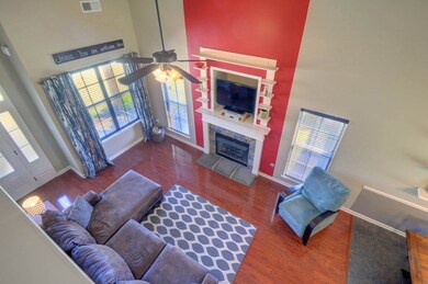 The open floor living area is perfect for entertaining. You can easily be in the kitchen and have guests enjoying appetizers at the breakfast bar, the dining area, or in the living room all while enjoying your company.