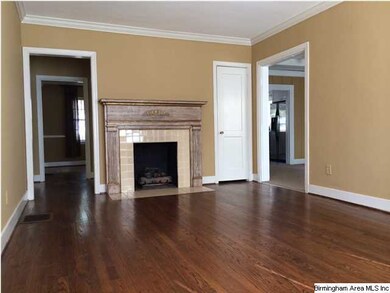 Living room is very nice with pretty floors!