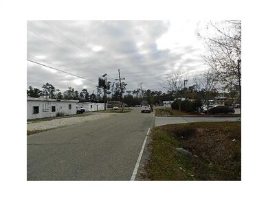 Land/Lot. The lot is located one block off Hwy 190