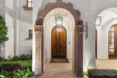 The intricately designed archway leads to an impre