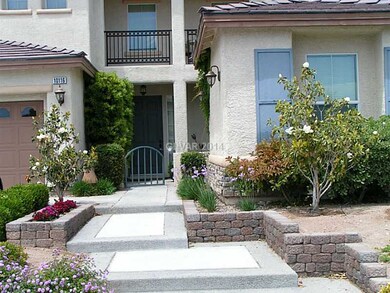 Property Photo. Front sidewalk