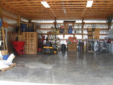 This shop has so many possibilities for use-storage, wood working, car maintenance and the list goes on and on.