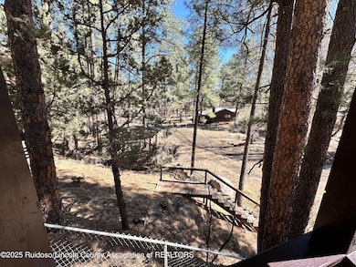 VIEW OFF COVERED DECK AT THE RIVER