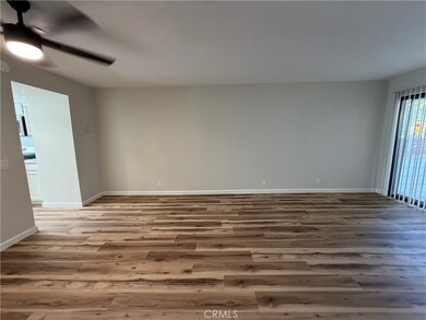 Side view of Living room / Den. Room to left is kitchen.