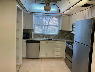 9481 Sunrise Lakes Blvd unit 102, Sunrise, FL 33322 - photo 4