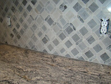 Granite and backsplash