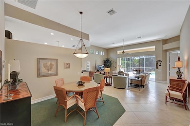 Dining room featuring light tile patterned floors,