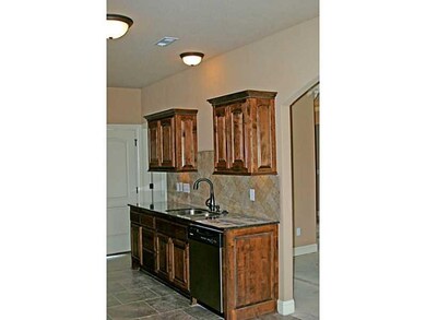 Kitchen. Under cabinet-lighting adds lots of warmt