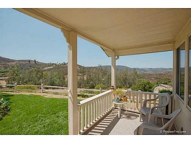 The entry of the home has a lovely front patio where you can sit and admire the views.