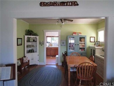 Formal Dining room with built-ins +ceiling fan-lov
