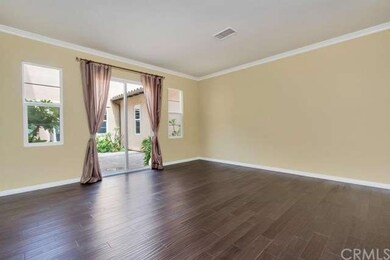 SPACIOUS LIVING ROOM, LEADS TO THE COURT YARD