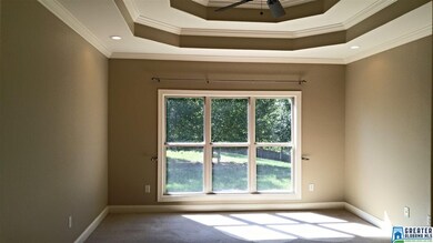Sizeable with double tray ceiling.