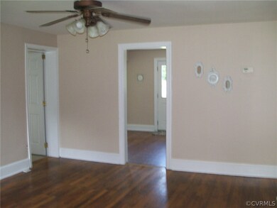 Living room with wood floors. All interior freshly painted