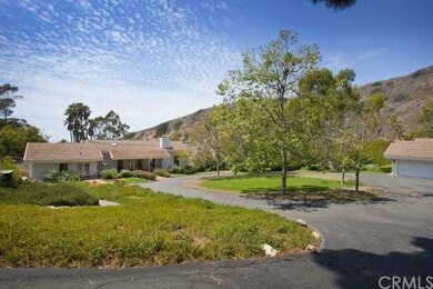 Front of Home, Circular Drive and detached Garage/