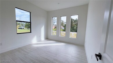 Spare room featuring a healthy amount of sunlight