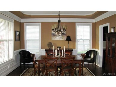 Formal dining room with tray ceiling, double crown