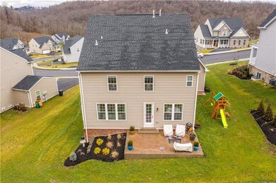 Back of the house. Beautiful landscaping and patio
