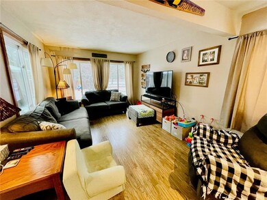 Living room area! Windows have been replaced with vinyl windows.