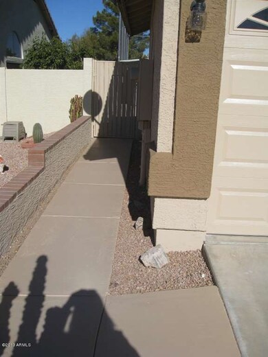 Sidewalk to Side Gate - East