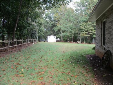Another view of the workshop and partial back yard
